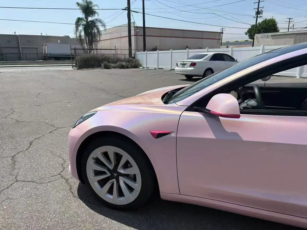 Laser Gloss Rouge Pink vinyl on Tesla Model 3 front-left corner - bumper holographic effect - Kaleido