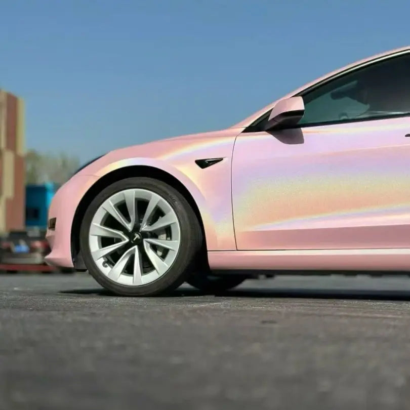 Laser Gloss Rouge Pink wrap on Tesla Model 3 front-left side - holographic pink effect - Kaleido