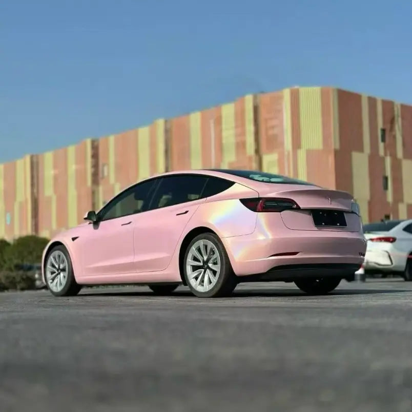 Laser Gloss Rouge Pink wrap on Tesla Model 3 rear-left - holographic tail light area - Kaleido