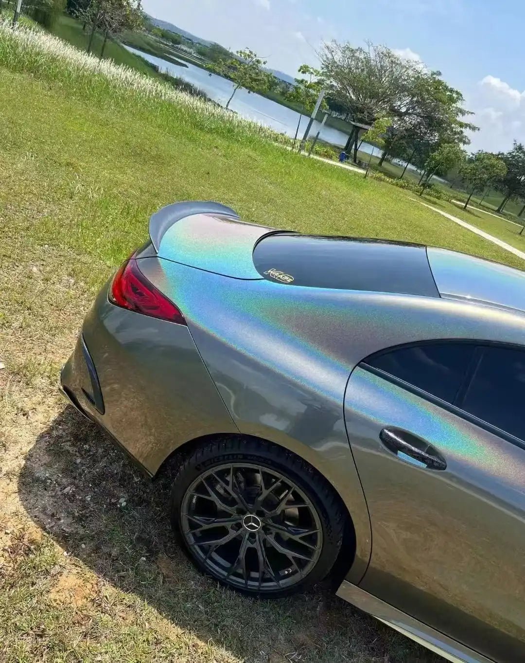 Laser Holographic Gray wrap on Mercedes CLA-Class - rear-right angle with color shift - Kaleido