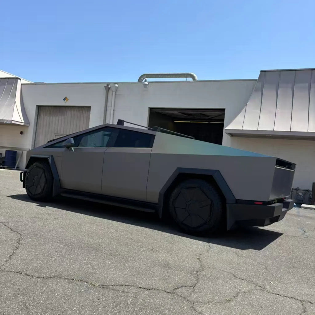 Tesla Cybertruck in Laser Satin Gray wrap - rear-left angle with satin finish and laser color shift - Kaleido