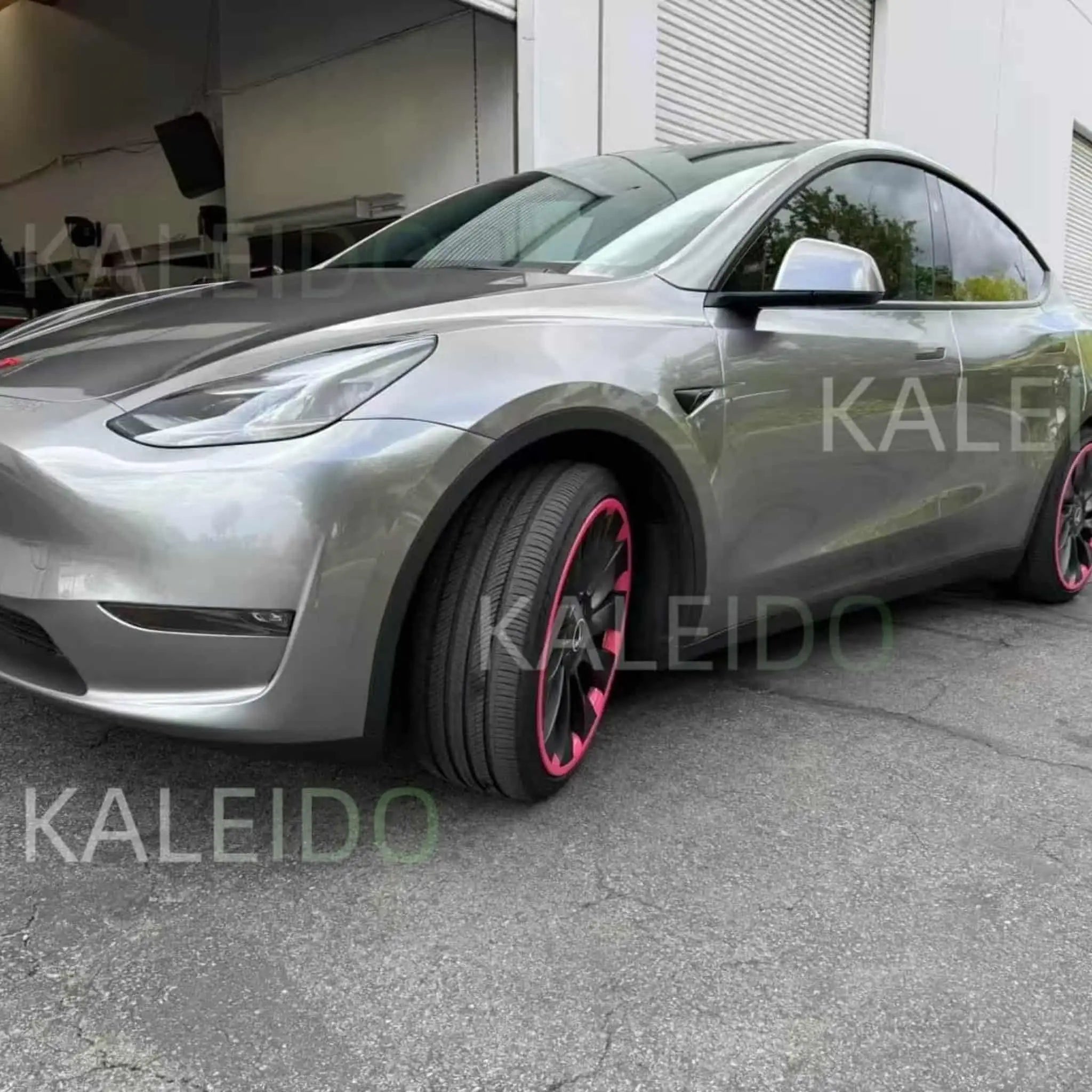 Close-up front-left detail of Liquid Silver wrap on Tesla Model 3 - Kaleido
