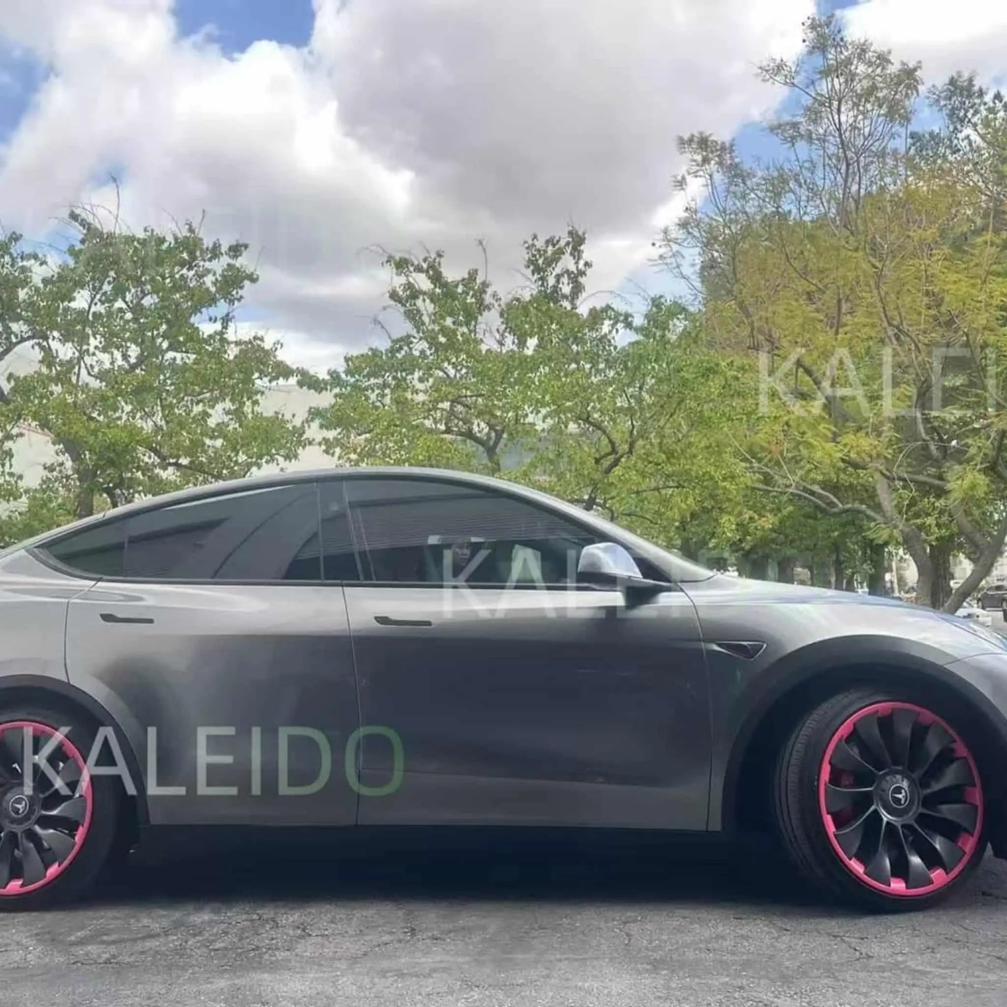 Right side profile of Tesla Model 3 in Liquid Silver gloss metallic vinyl - Kaleido