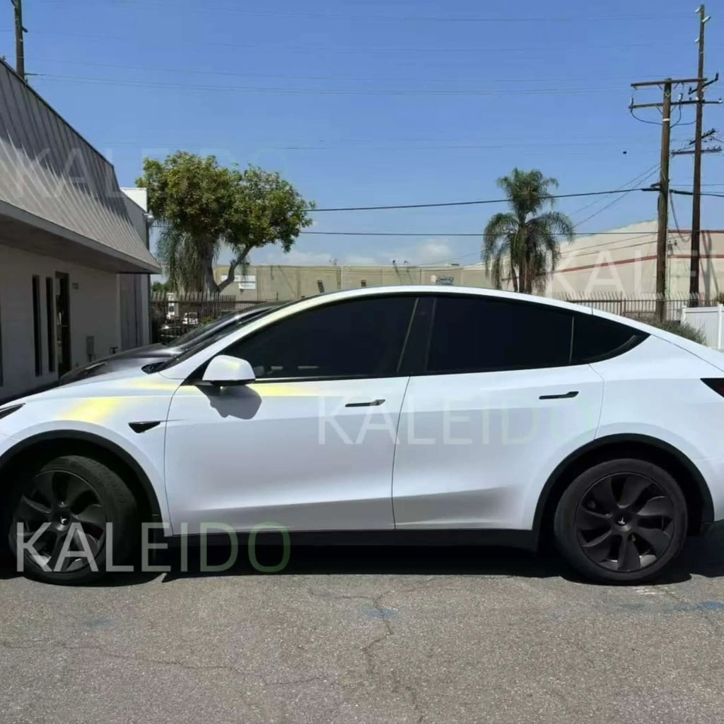 Left side profile of Tesla Model 3 with Matte Diamond Iridescent White Gold matte vinyl - Kaleido