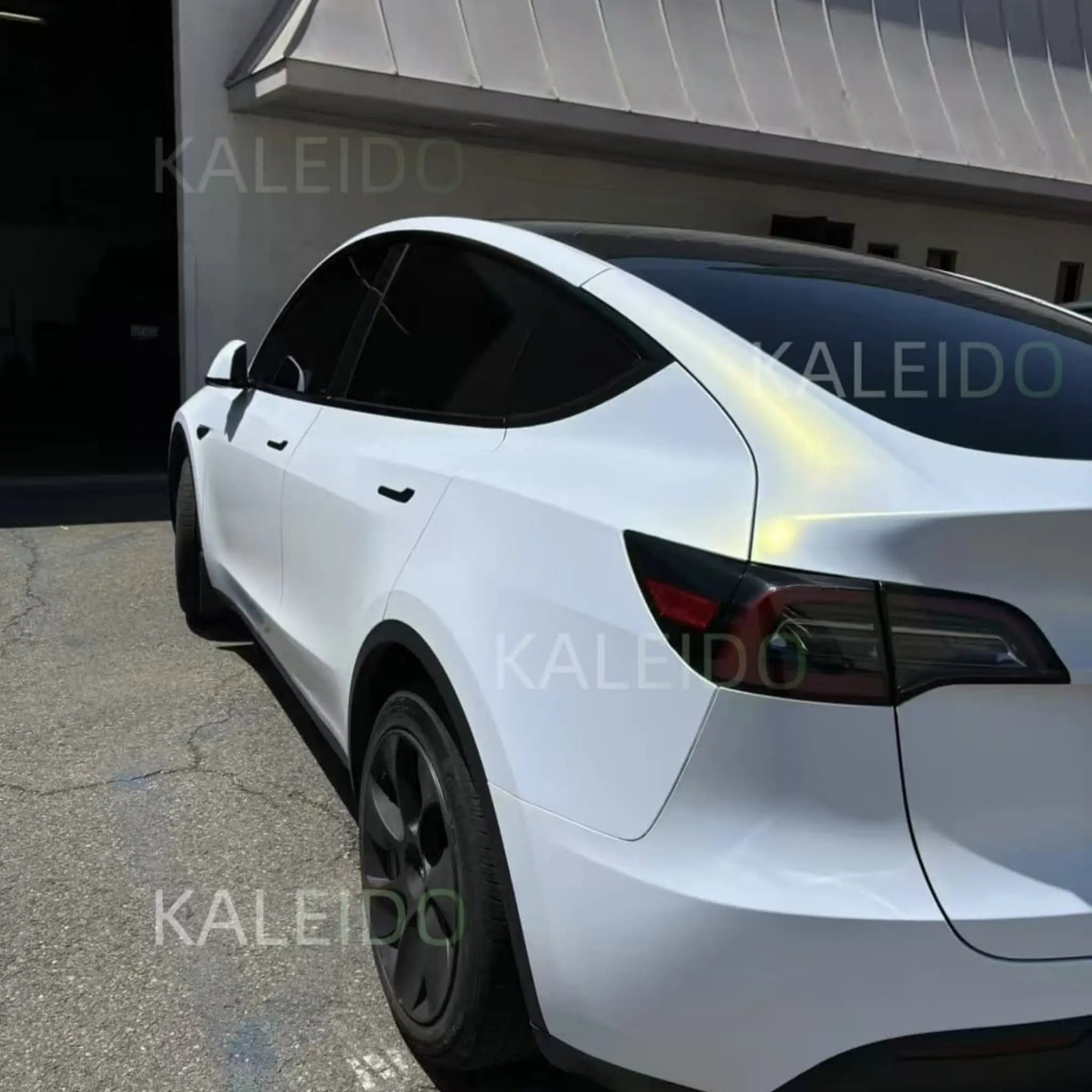 Matte Diamond Iridescent White Gold film on Tesla Model 3 - rear-left view - Kaleido
