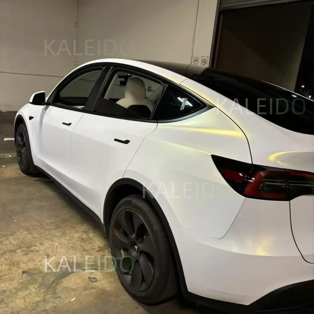 Matte Diamond Iridescent White Gold wrap on Tesla Model Y - rear-left view - Kaleido