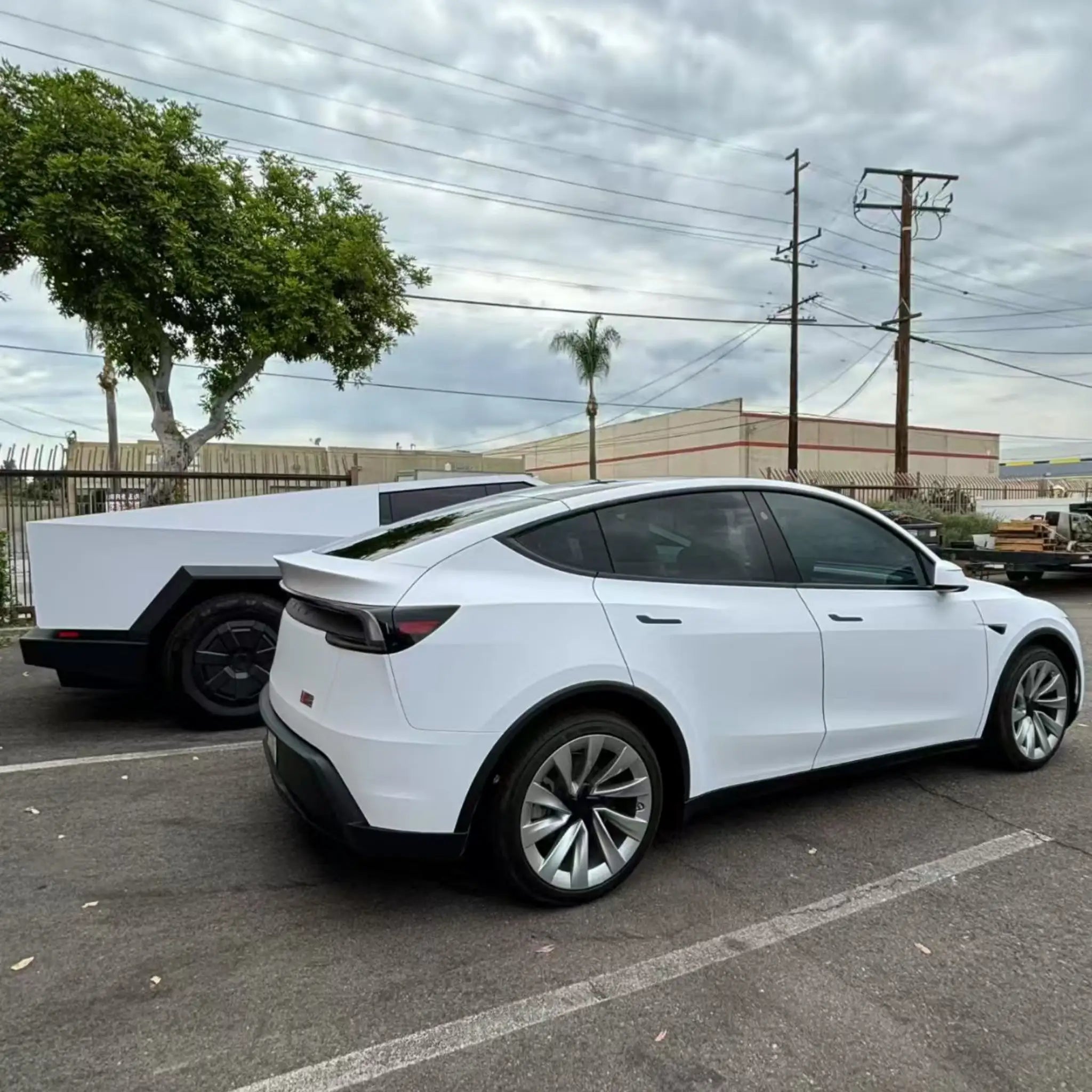 Matte Lunar White wrap on Tesla Model Y - rear-right view with velvety matte texture - Kaleido