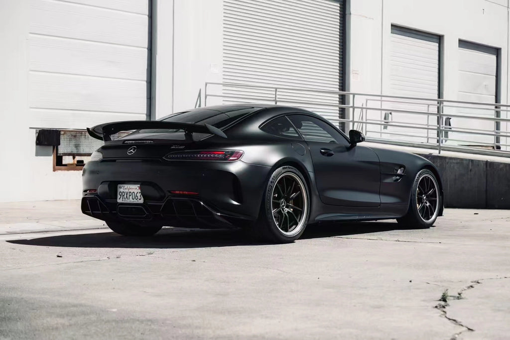 Rear-right view of Silky Noir wrapped AMG GT R - showcasing rear wing and diffuser - Kaleido