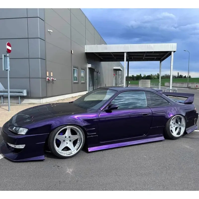 Clean side profile of the Nissan Silvia S14 in Midnight Purple Metallic gloss vinyl wrap - Kaleido
