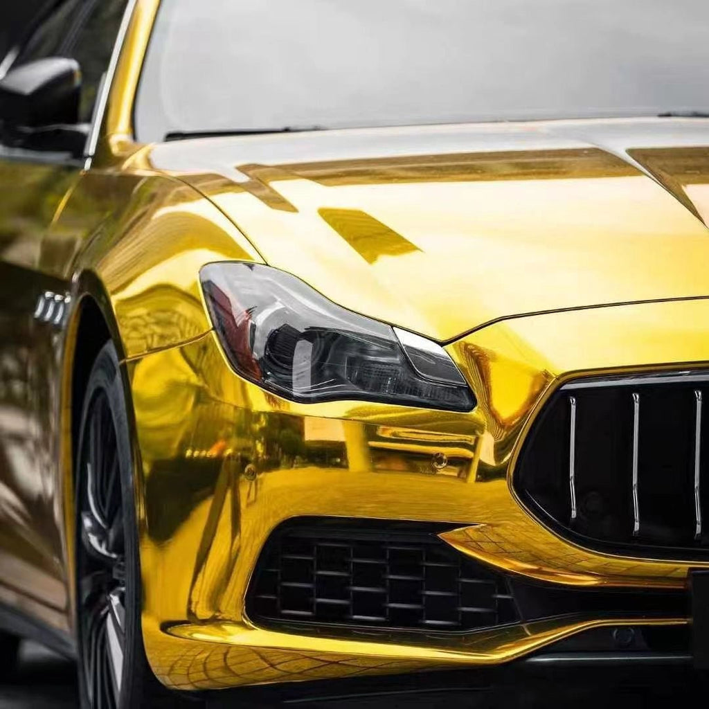 Mirror Chrome Gold vinyl on Maserati Quattroporte front-right corner - precise mirror finish - Kaleido