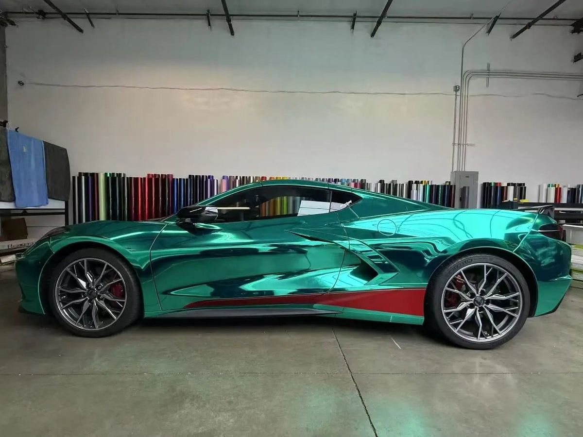 Full side view of Mirror Chrome Green wrapped Corvette C8 indoors - studio lighting effect - Kaleido