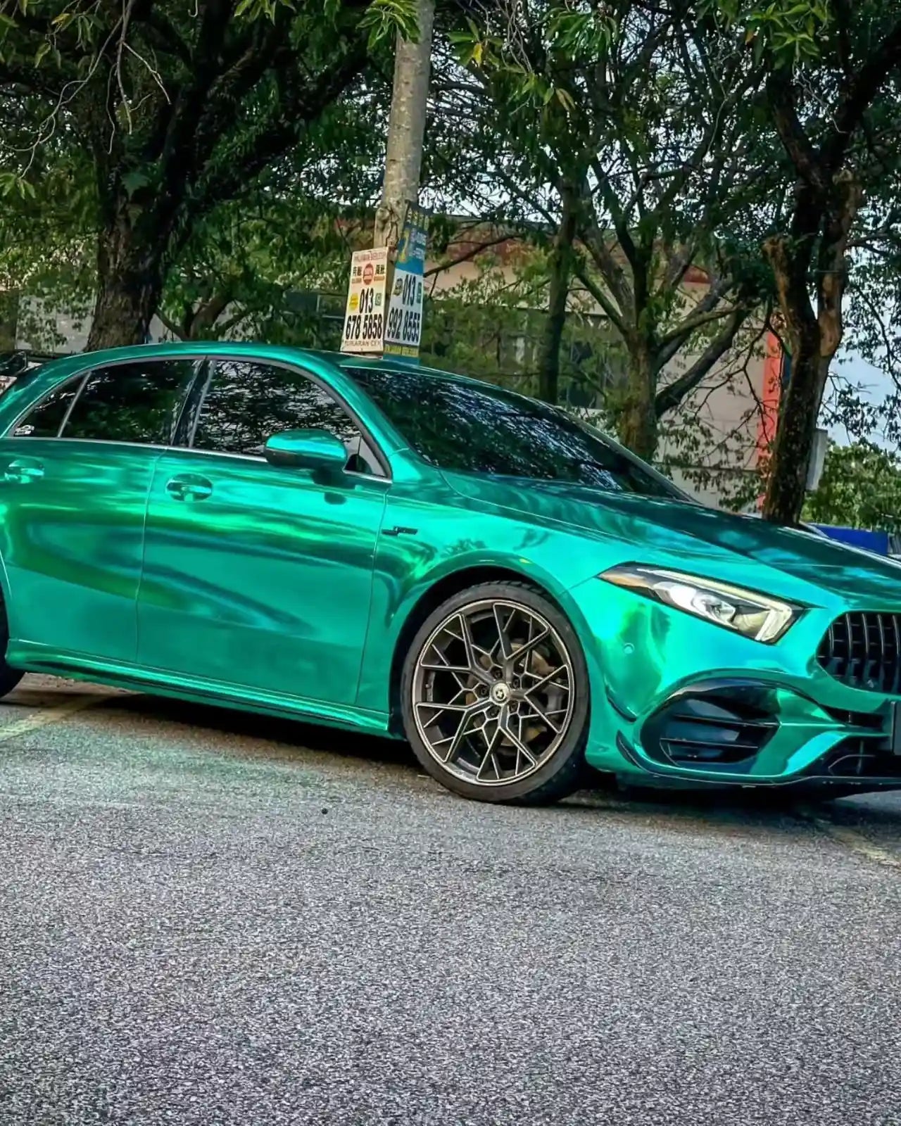 Mercedes-AMG A45 in Mirror Chrome Green - front-right panoramic view - Kaleido