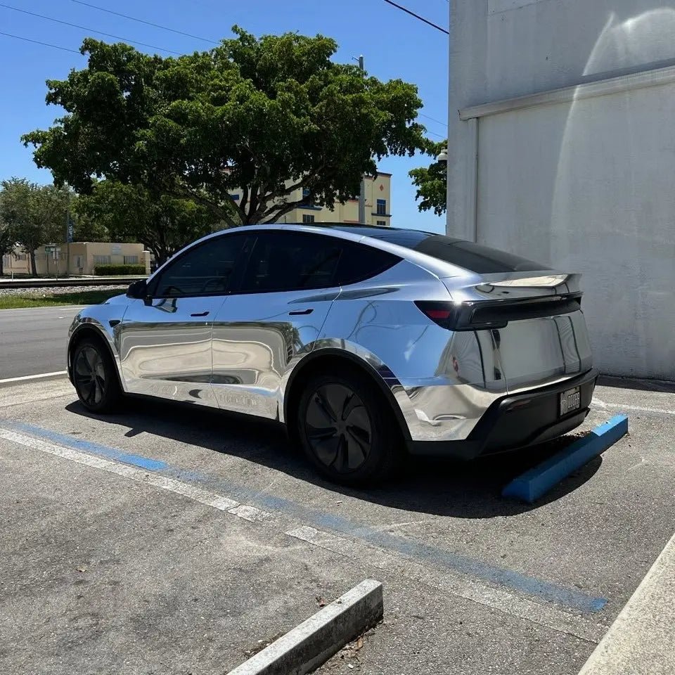 Mirror Chrome Silver wrap on Tesla Model Y - rear-left view with mirror reflection - Kaleido