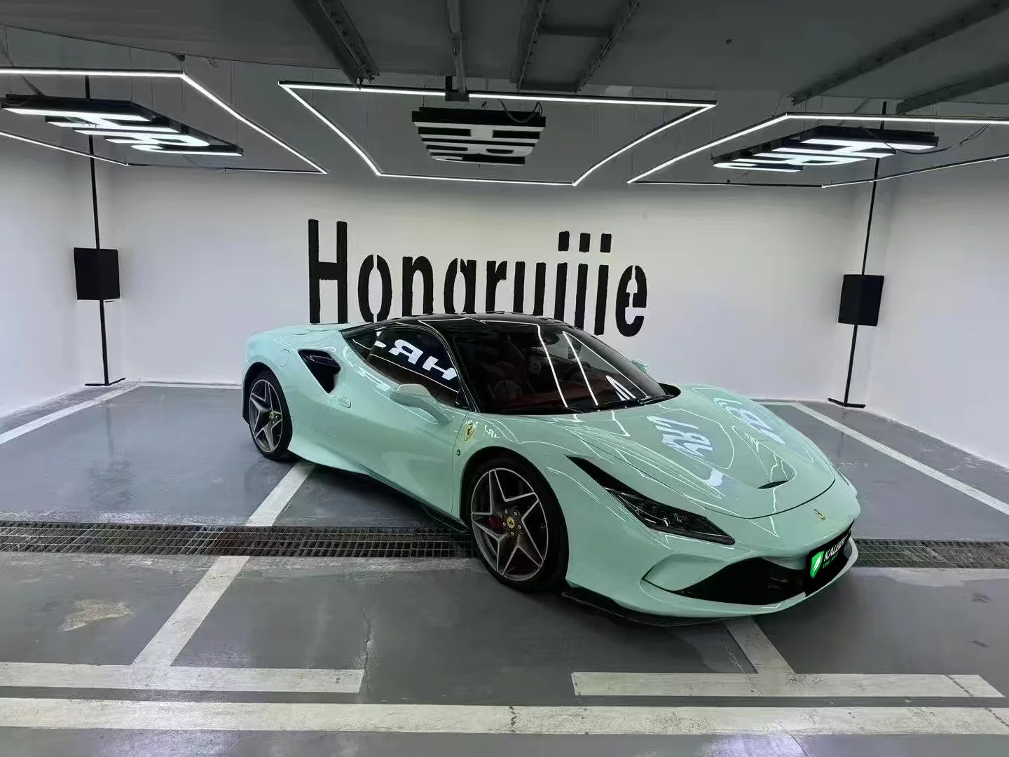 Ferrari F8 Tributo in Rolls-Royce Sagano Green wrap - front-right angle - Kaleido