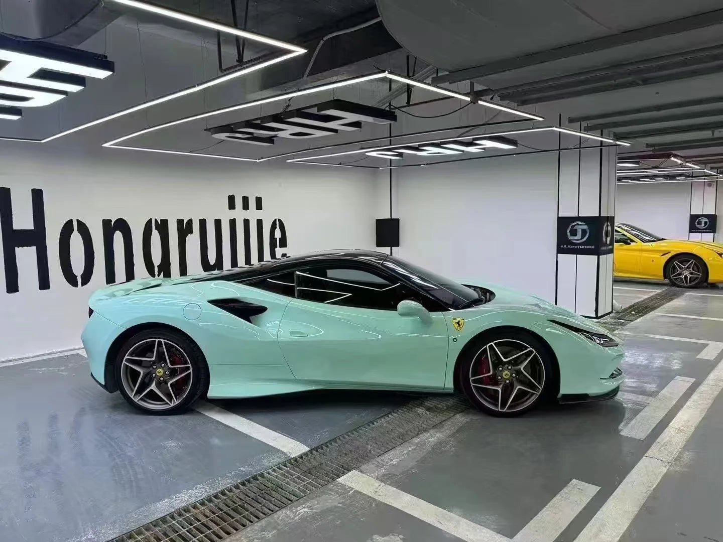 Right side profile of a Ferrari F8 Tributo with Rolls-Royce Sagano Green vinyl - Kaleido