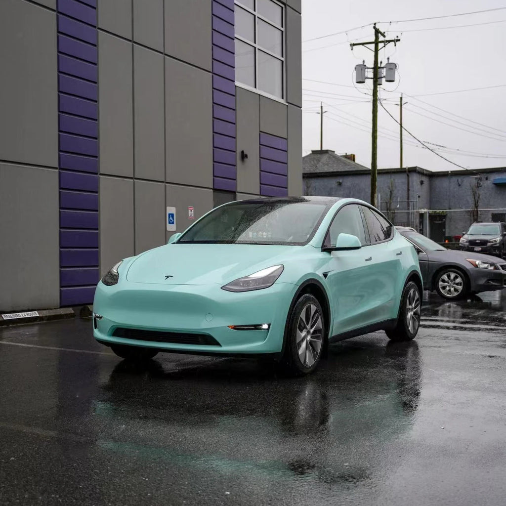 Tesla Model Y in Rolls-Royce Sagano Green vinyl - front-left view - Kaleido