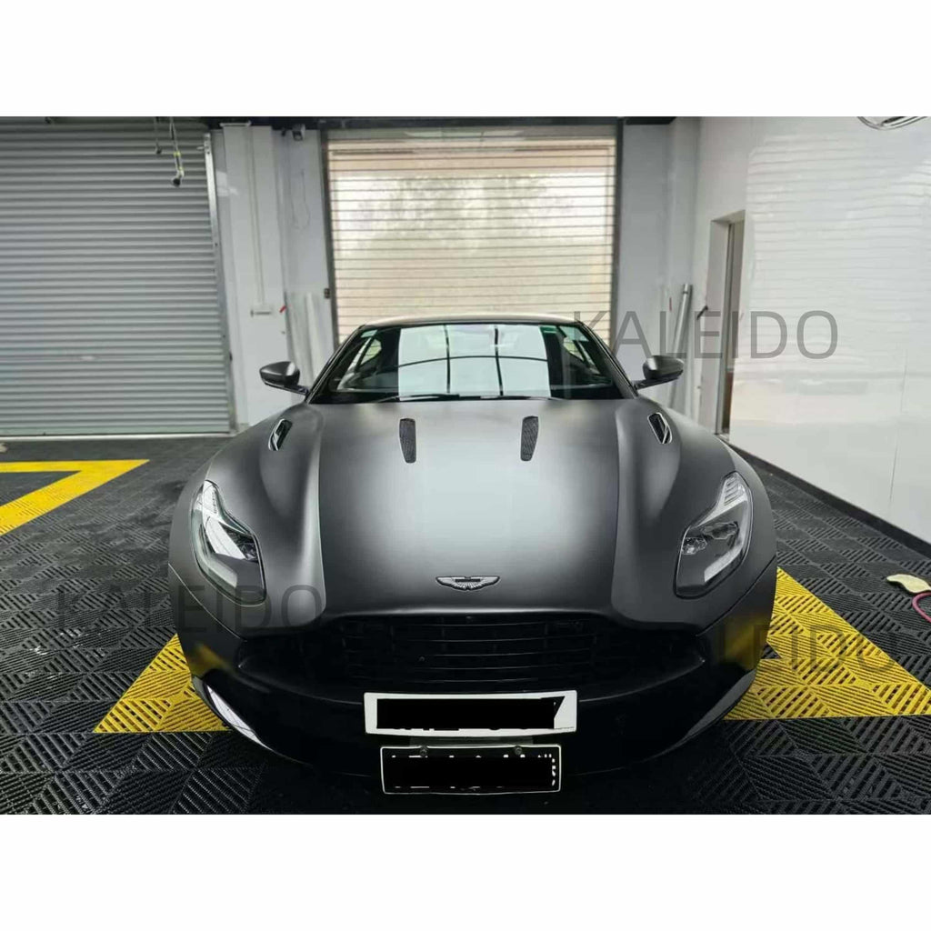 Front view of an Aston Martin DB11 in AMG Selenite Grey satin chrome wrap - Kaleido