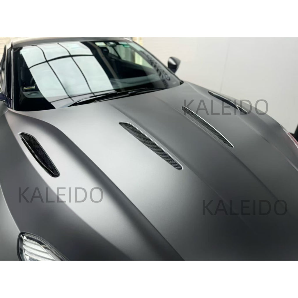 AMG Selenite Grey satin chrome vinyl flowing over the hood of the Aston Martin DB11 - Kaleido