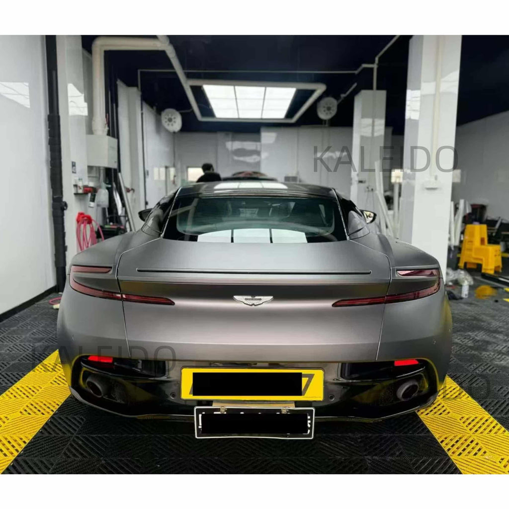 Rear view of the Aston Martin DB11 wrapped in AMG Selenite Grey satin chrome vinyl - Kaleido