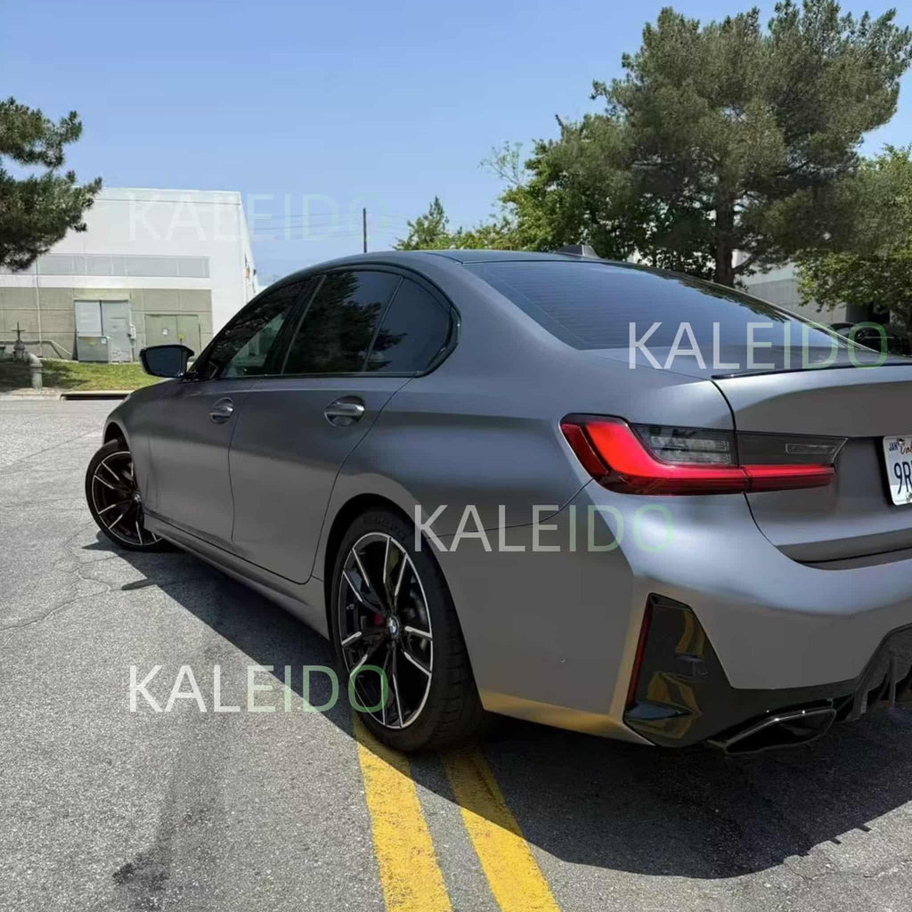 Rear-left angle of satin chrome wrapped BMW 3 Series - Kaleido