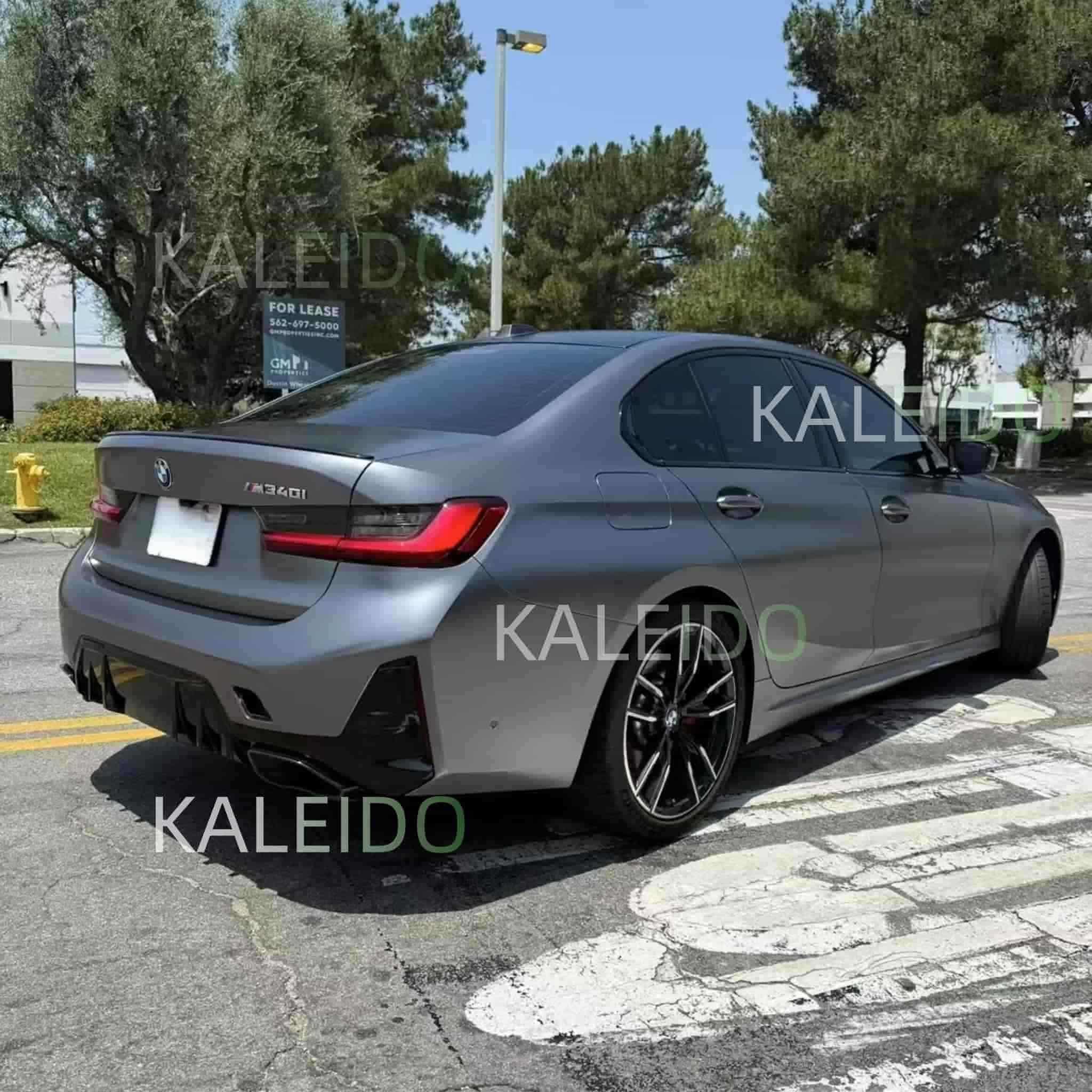 Rear-right view of BMW 3 Series in AMG Selenite Grey wrap - Kaleido