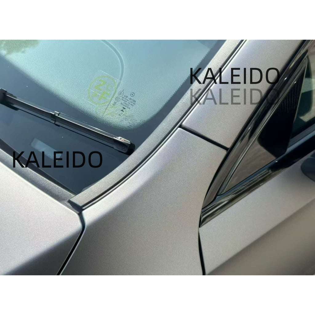 Close-up of the metallic flake pattern on AMG Selenite Grey satin chrome wrap - Kaleido