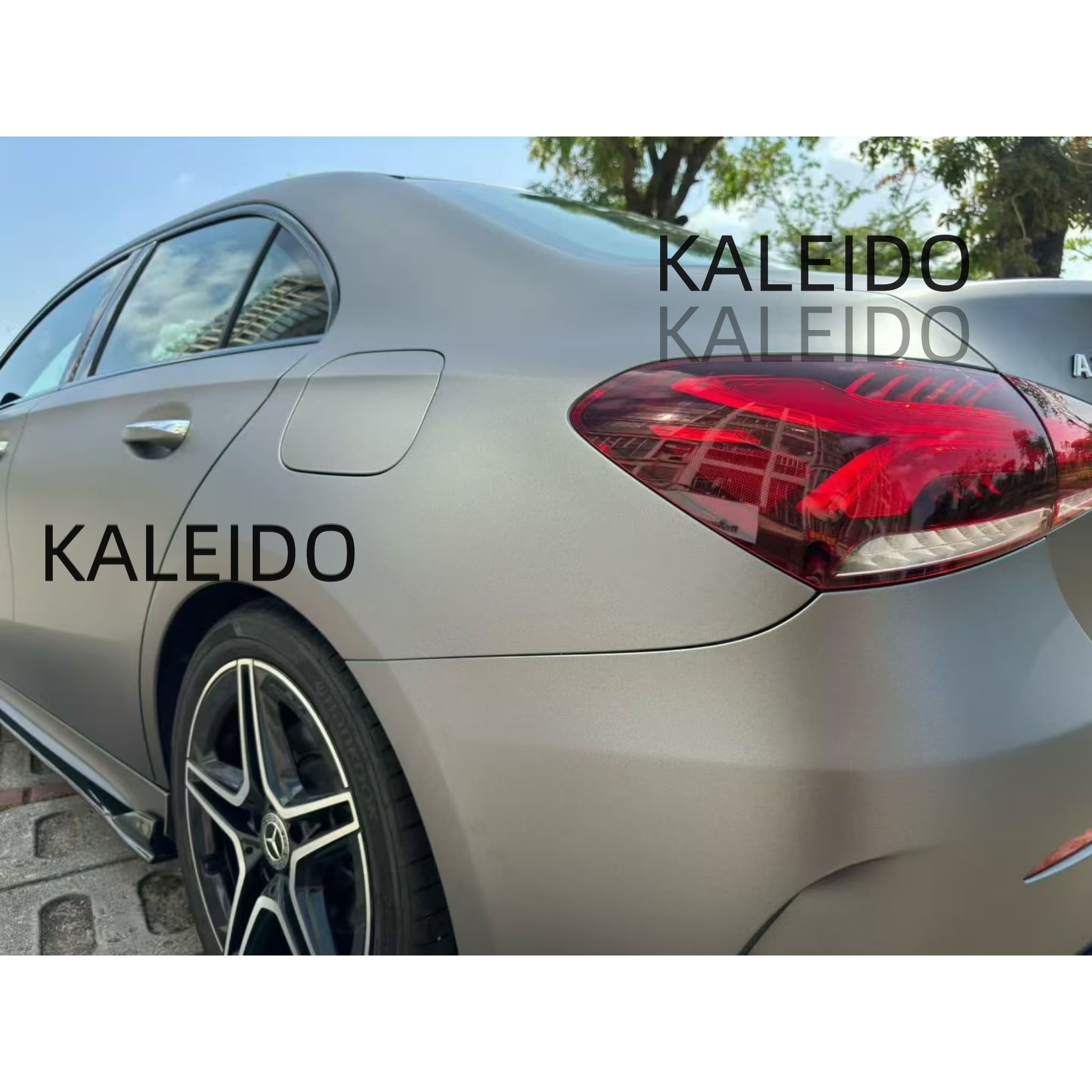 Rear-left three-quarter view of the satin chrome wrapped Mercedes A220 - Kaleido