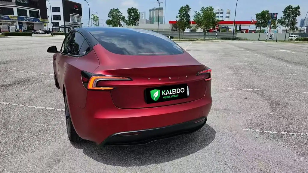 Tesla Model 3 in Satin Chrome Romanee Red - rear-left view with elegant matte chrome effect - Kaleido