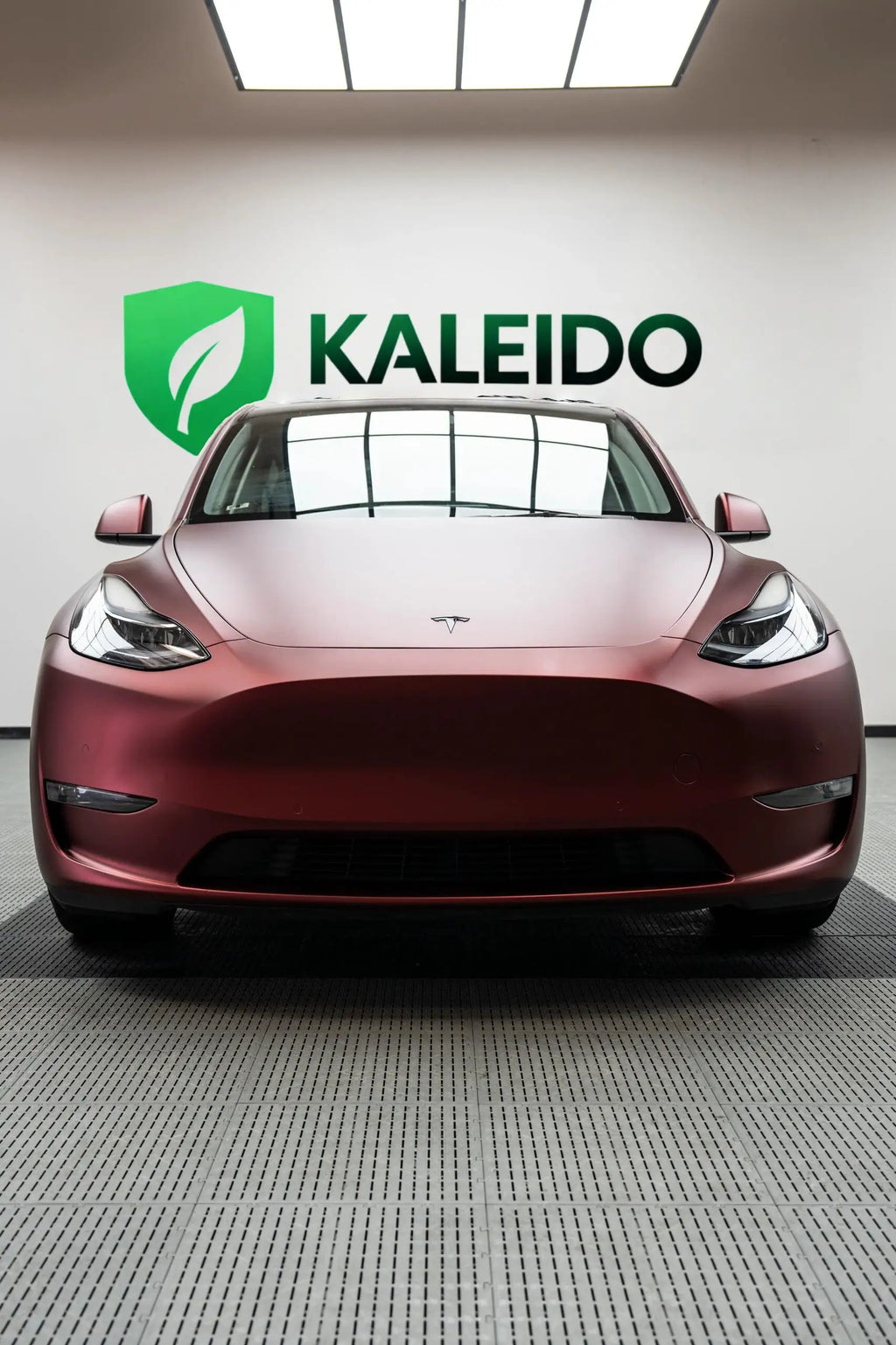 Front view of Tesla Model Y wrapped in Satin Chrome Silk Red - elegant red SUV - Kaleido