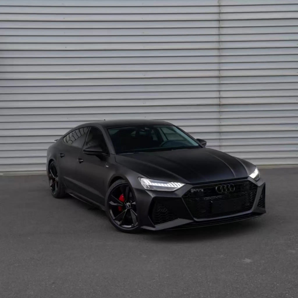 Wide front-right view of an Audi RS7 Sportback (C8) in Satin Chrome Vantablack wrap - Kaleido