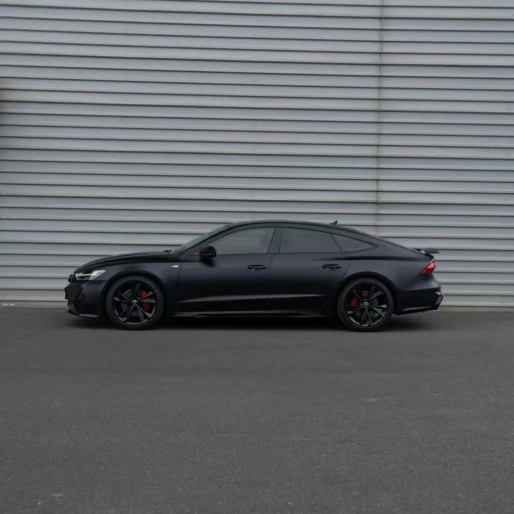 Left side profile of an Audi RS7 Sportback (C8) with Satin Chrome Vantablack vinyl - Kaleido