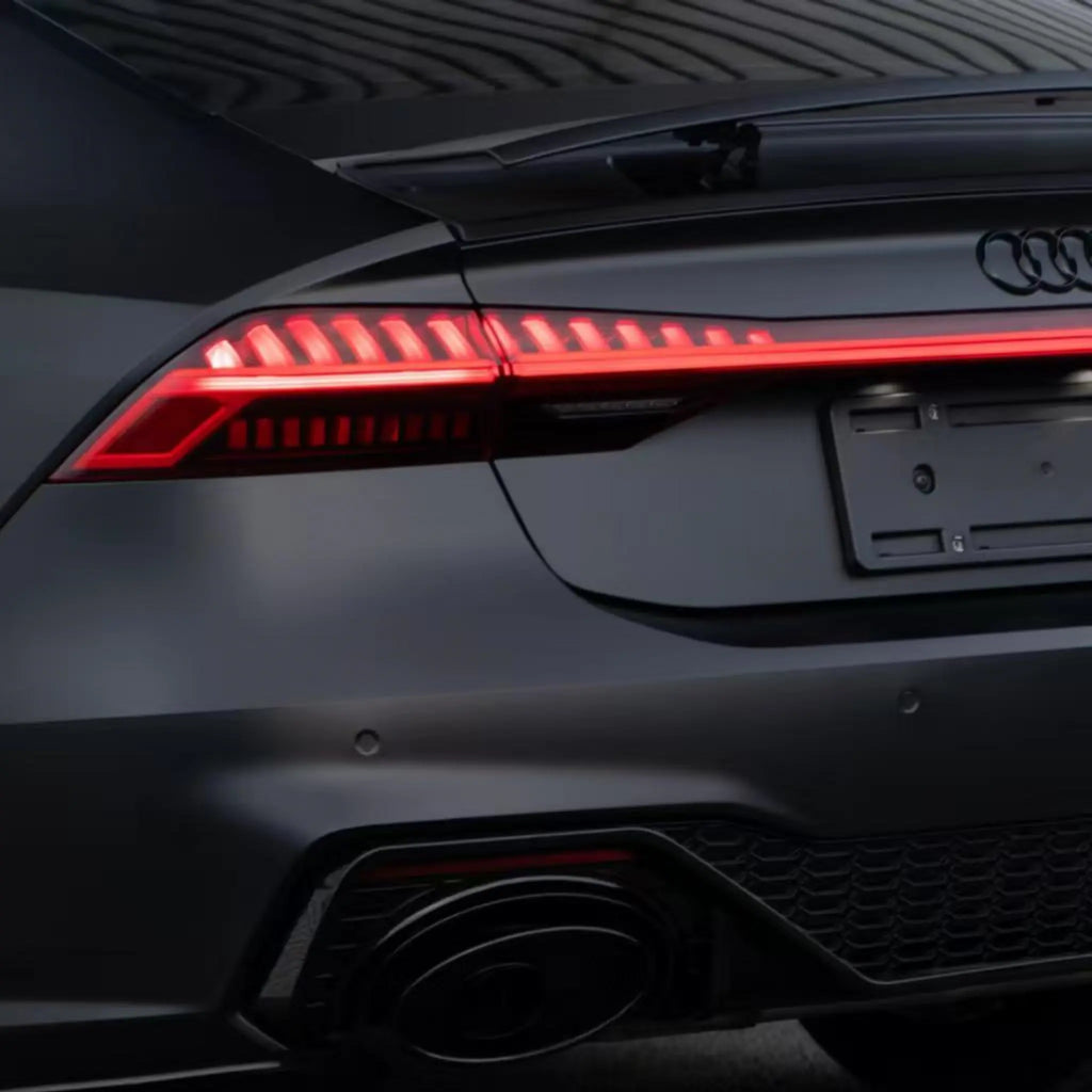 Detailed shot of the Satin Chrome Vantablack finish on an Audi RS7 Sportback (C8) rear bumper - Kaleido