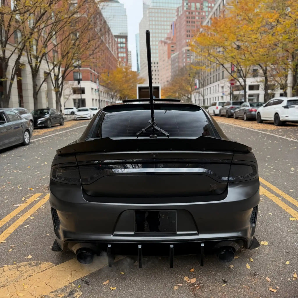 Rear view of a widebody Dodge Charger SRT with Satin Chrome Vantablack vinyl wrap - Kaleido