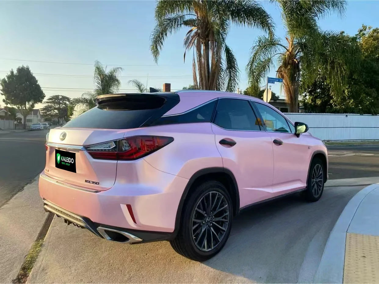 Rear-right view of a Lexus RX with Satin Metallic Sakura Pink vinyl film - Kaleido