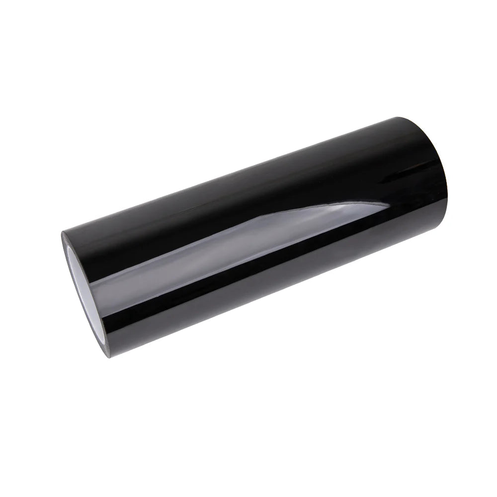 Self-healing TPU Deep Black Headlight Tint roll on white background - Protective dark film with glossy finish - Kaleido