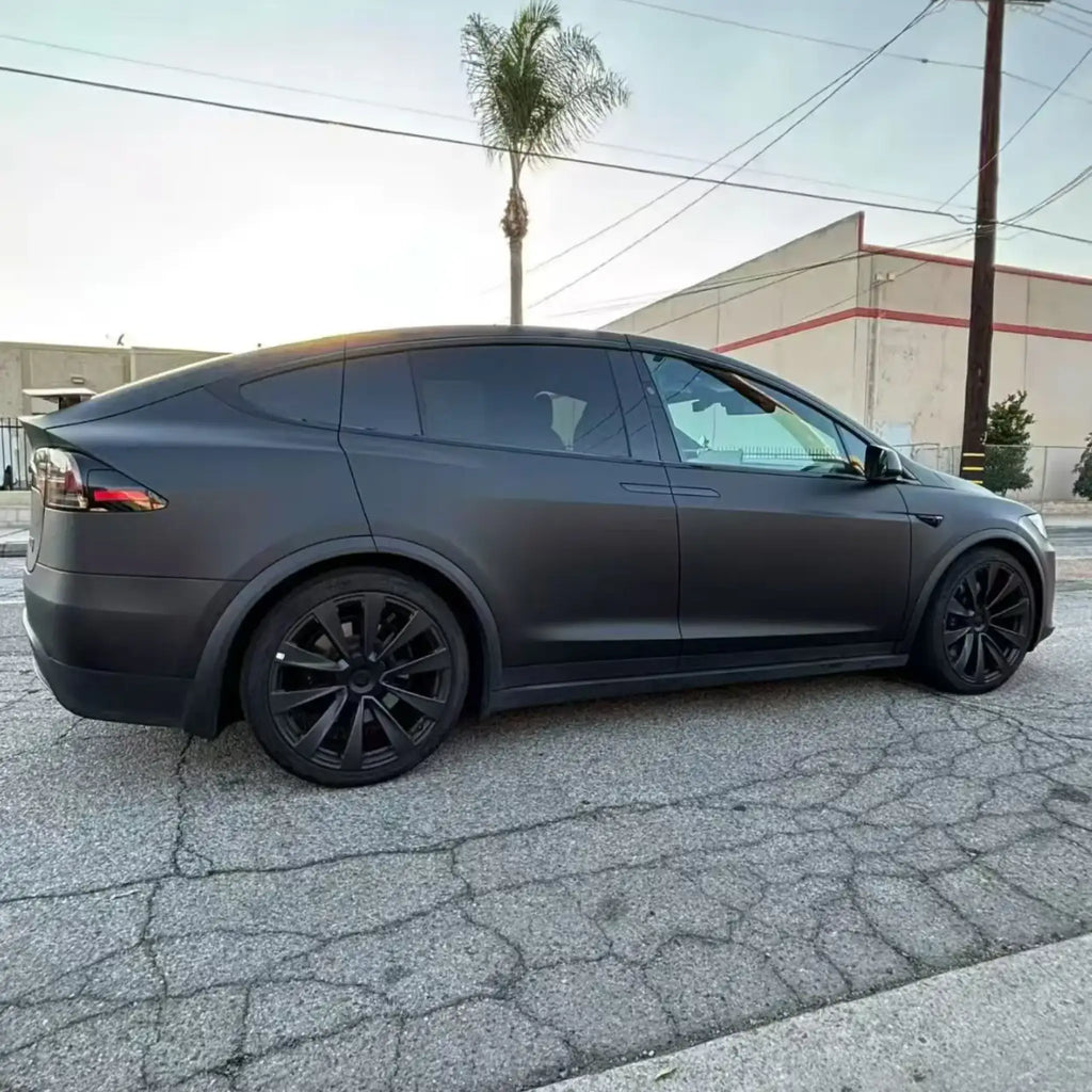 Right side view of Tesla Model X in Stealth Matte Black vinyl - complete side profile - Kaleido