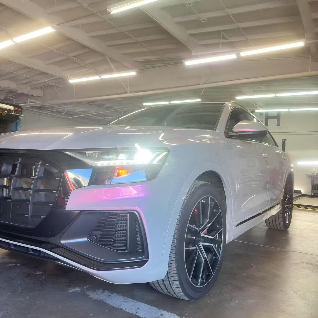 Close-up of Volcanic Aura color shift wrap on front-left of Audi Q8 - grey to pink transition - Kaleido
