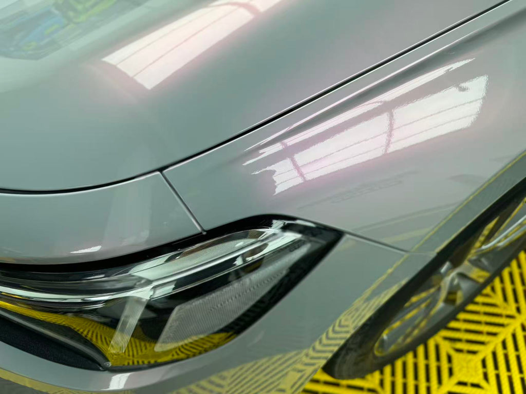 Close-up detail of Volcanic Aura film on Honda Civic front-left - color shift texture - Kaleido