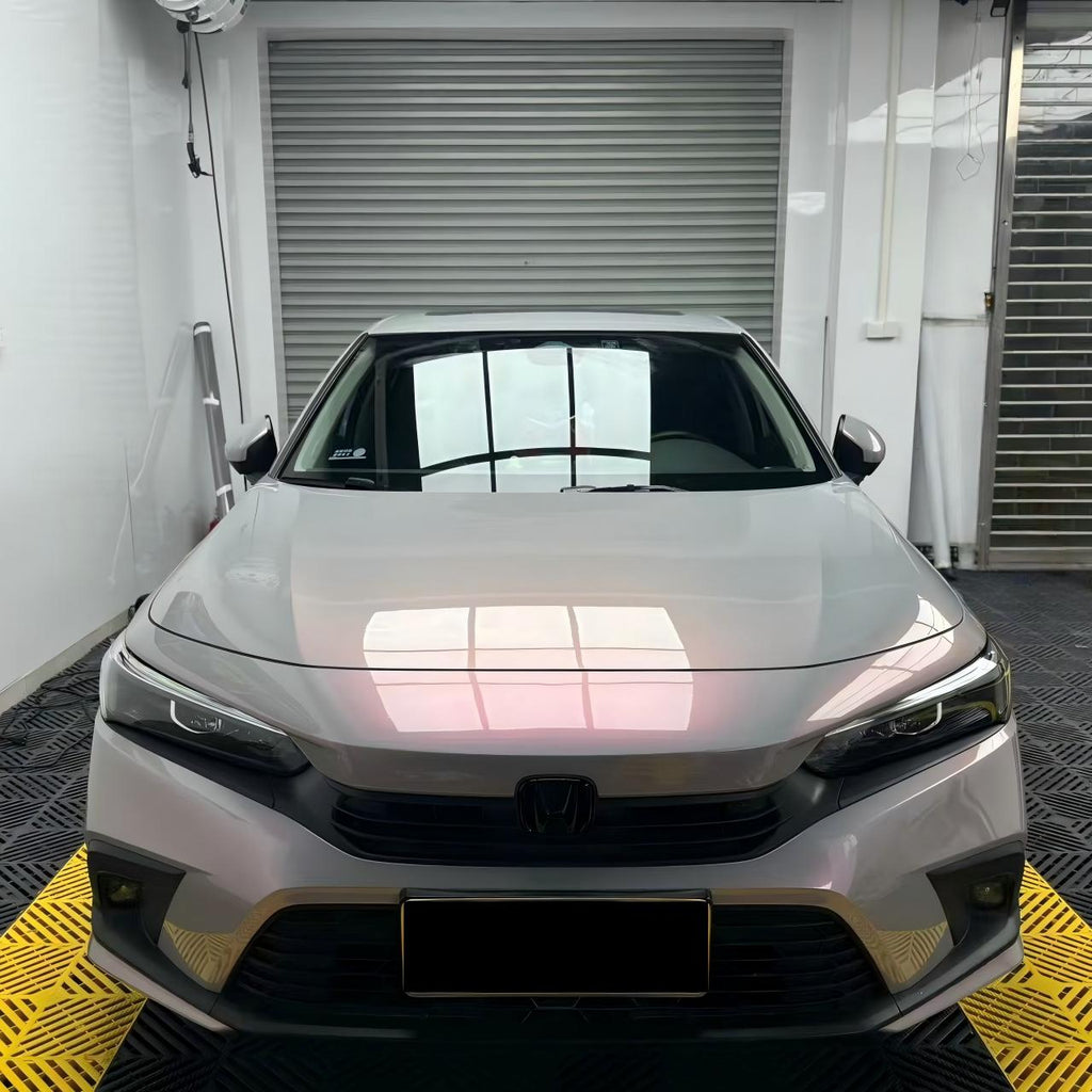 Front view of Honda Civic with Volcanic Aura color shift vinyl wrap - Kaleido